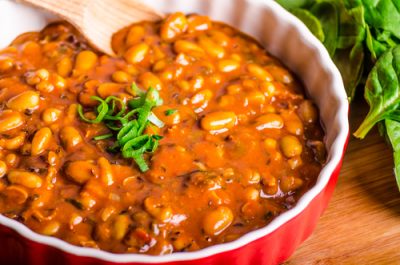 Spicy cowboy beans with hassleback potatoe with herbs