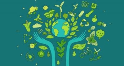 green hands with earth
